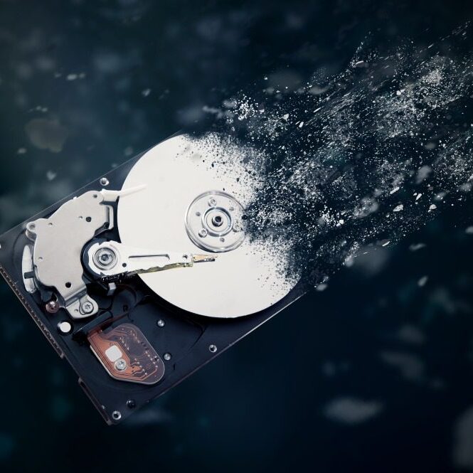 An old hard drive being destroyed.